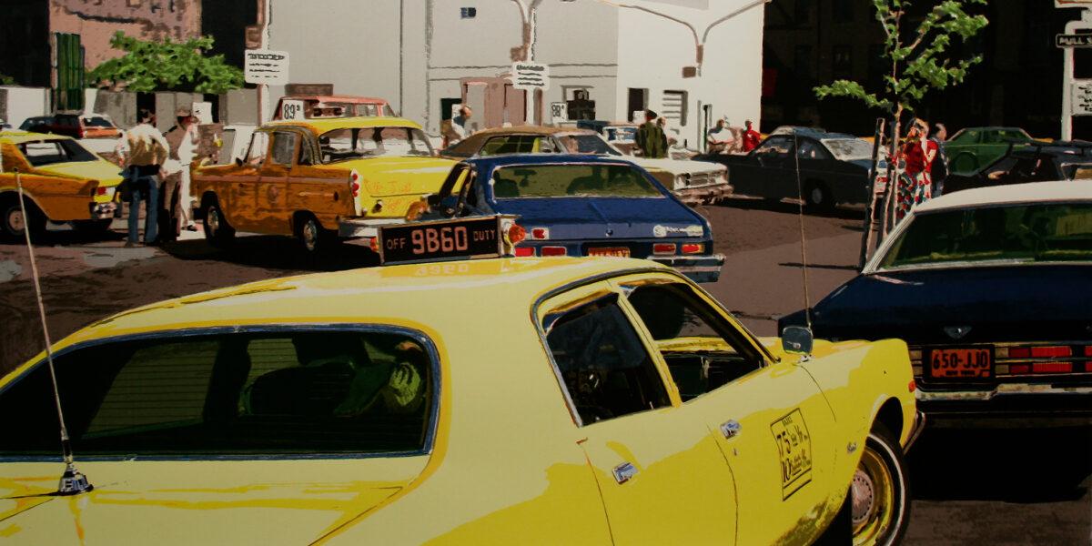 Yellow taxis and cars in a busy urban street scene under bright sunlight.