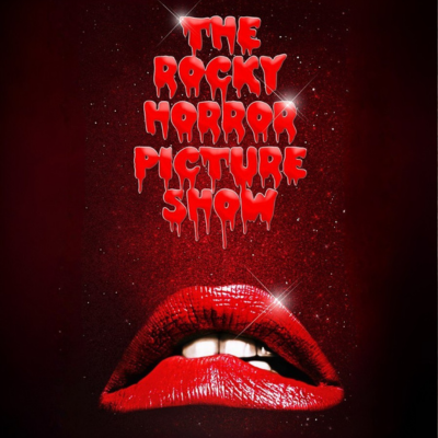 Red lips with a dark red backdrop, sparkling text above.