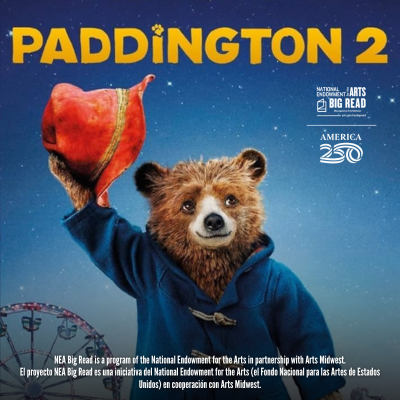 Bear in blue coat holding a red hat with a cityscape background, text "Paddington 2."