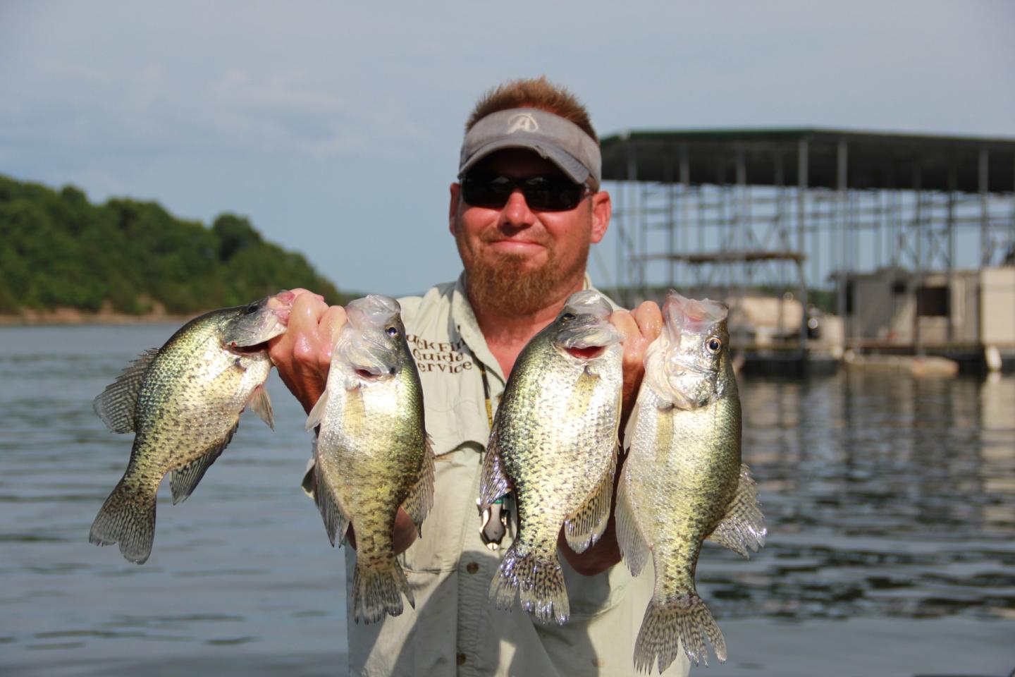 Rance with fish on Beaver Lake.