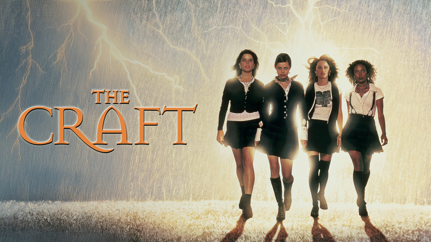 Poster for The Craft, showing four young women in black against a stormy sky.