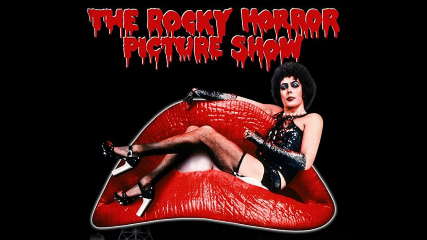 The Rocky Horror Picture Show logo above a woman reclining on red lips.