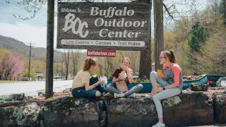 Friends eating deli sandwiches from Buffalo Outdoor Center in Arkansas