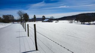 Snow on a Barn along the Highway