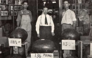 1925 - John S. Gibson, Originator of Hope's First Watermelon Growing Contest - Hugh Laseter, Mr. Gibson, and Edgar Laseter are shown here with the large watermelons of 1925. Seeds from the 136-pound winning watermelon were returned by President Coolidge to the grower, Hugh Laseter. The contest became a city-wide event the following year with a watermelon festival, parade, and growing contest. 
