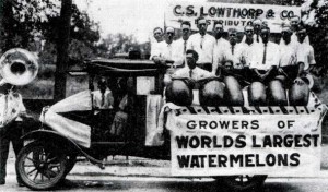 1927 - Entry in the 1927 Parade. Mr. Lowthorp created the Hope market for giant watermelons through business and railroad convention contacts in the off-season. These men of Rocky Mound and Shover Springs supplied him with the giants for his sales. The group included four men who grew world record giant watermelons. Arthur Powell grew the winning melon for 1927 in the Rocky Mound community. Photo Courtesy of the Hope Star