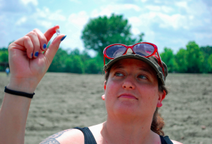 Bobbie Oskarson of Colorado with her diamond! Photo courtesy of Arkansas State Parks. 