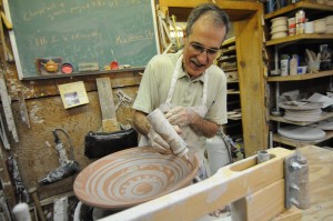 Jim Larkin making pottery. Photo by Z. Clift