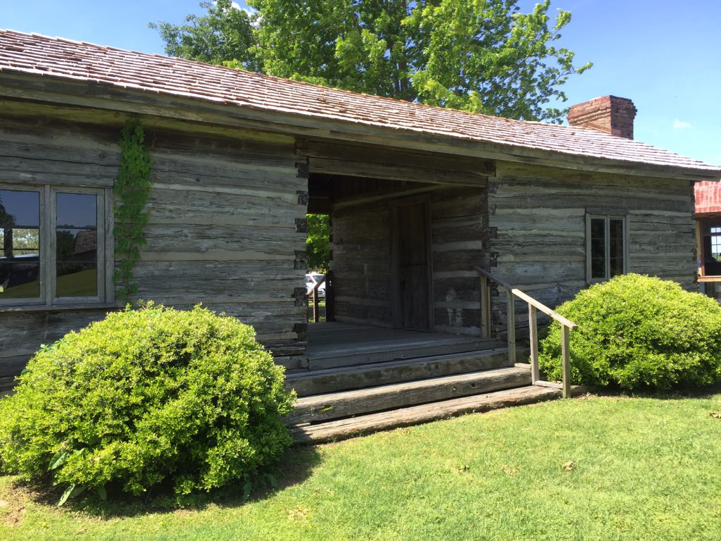 The Ashley-Alexander Log Dogtrot House, circa 1840, is the oldest original structure at the Settlement. The house is full of artifacts that exemplify its history, including raw cotton, spinning wheel and loom, as well textiles and home decor made of cotton. Kids can try a hand at cleaning cotton to see how much work it was. If you have a big enough group, you can see what it feels like to cram 18 kids into one room; an owner of a house this size could easily have had that many, and they all had to sleep somewhere—hopefully some of them in an additional loft space!