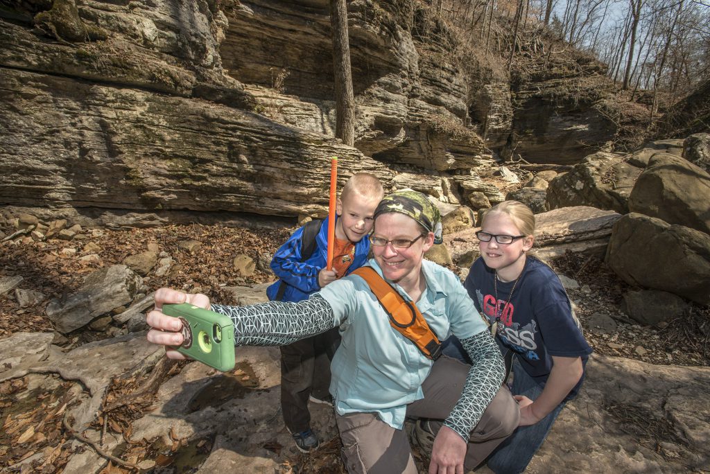 Tanya Reddin pauses for a selfie with two of her five children.